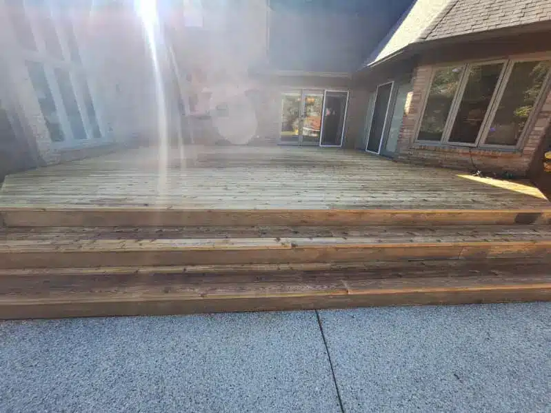 Clean wood deck surface ready for sealant application