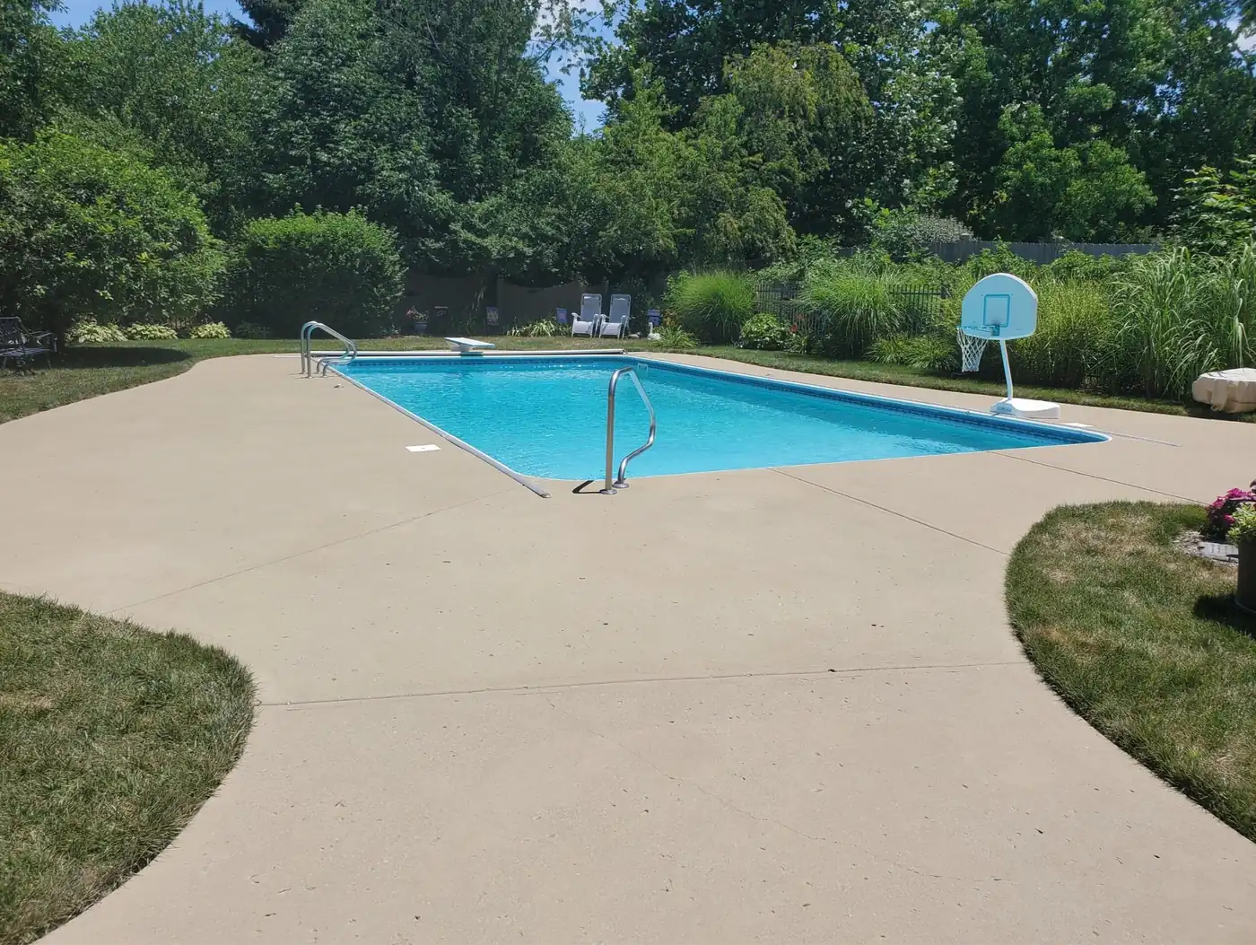 Stained concrete pool deck in Desert Sand color, Indianapolis